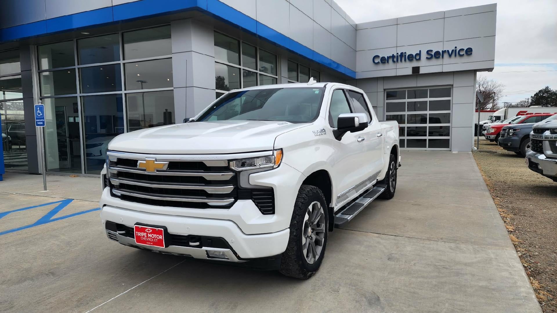 2024 Chevrolet Silverado 1500 High Country in Iridescent Pearl Tricoat — front three-quarter view