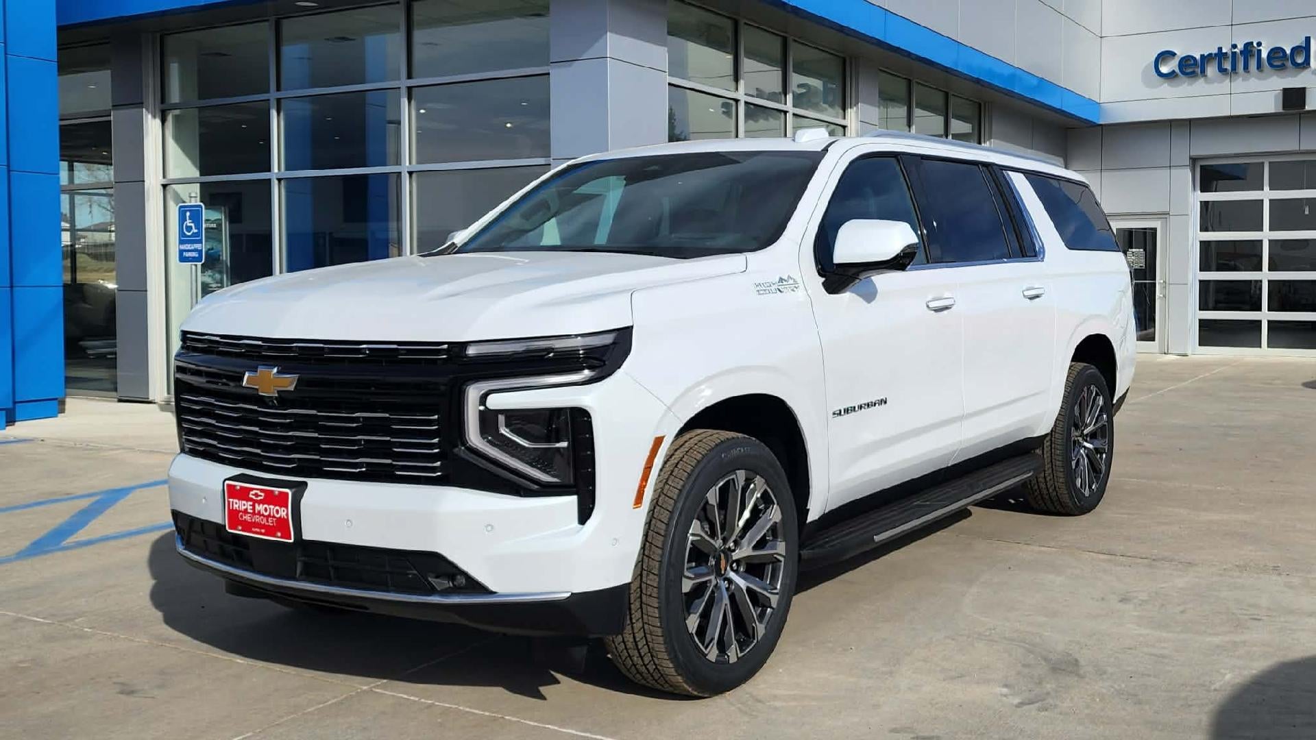 2026 Chevrolet Suburban High Country in Polar White Tricoat — front three-quarter view