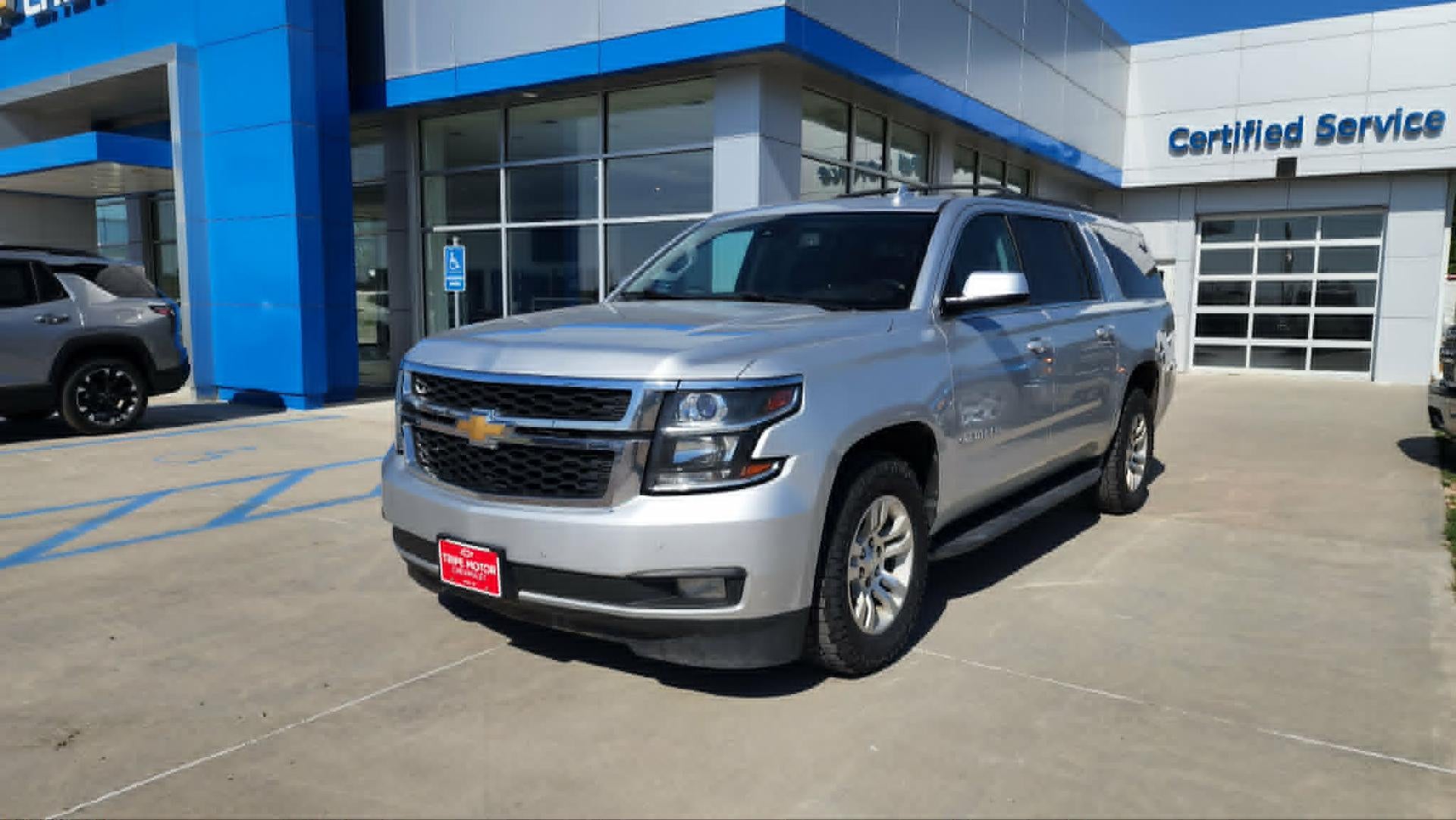 2017 Chevrolet Suburban LT in Silver Ice Metallic — front three-quarter view