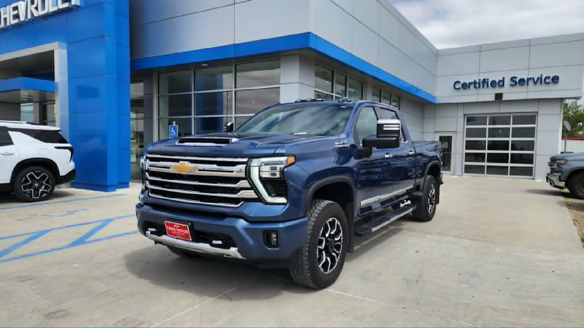 2024 Chevrolet Silverado 2500 HD High Country in Lakeshore Blue Metallic — front three-quarter view