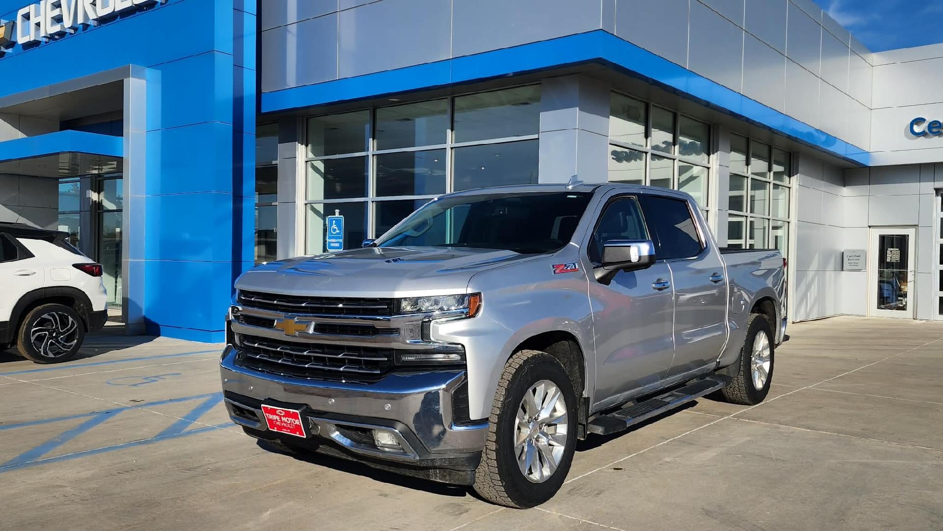 2021 Chevrolet Silverado 1500 LTZ in Silver Ice Metallic — front three-quarter view