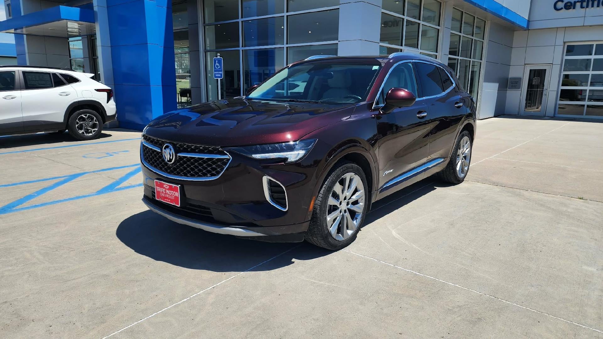 2021 Buick Envision Avenir in Rich Garnet Metallic — front three-quarter view